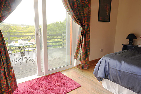 Wicklow Way Lodge, Oldbridge. County Wicklow | Bedroom to Balcony